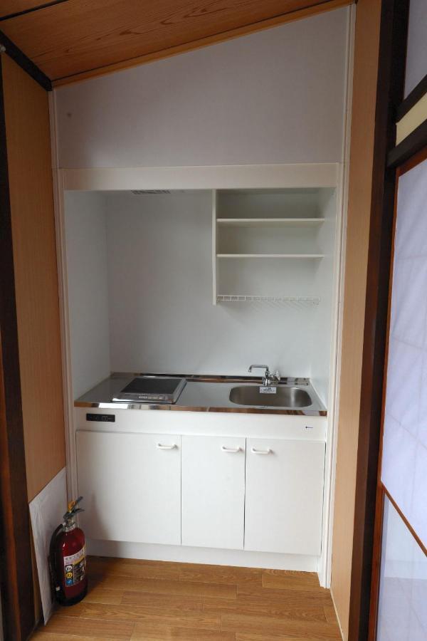 Guesthouse Iwase Toyama Station Екстериор снимка