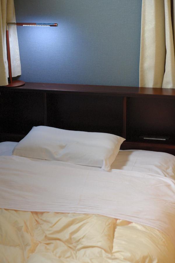 Guesthouse Iwase Toyama Station Екстериор снимка